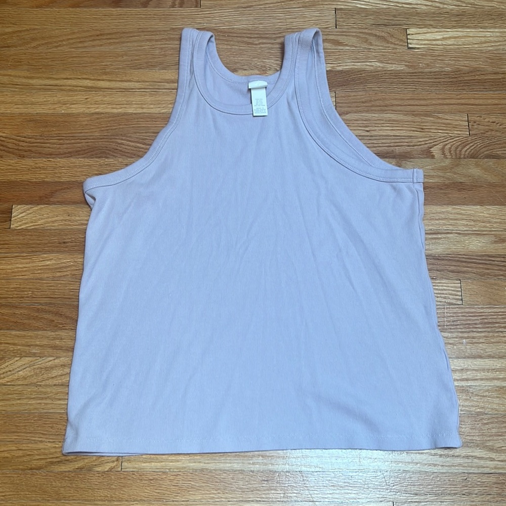 A pastel purple tank top. Size XXL. Very good condition